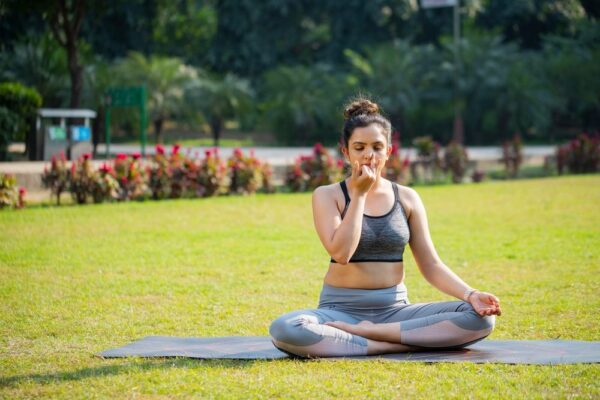 women practicing anulom vilom