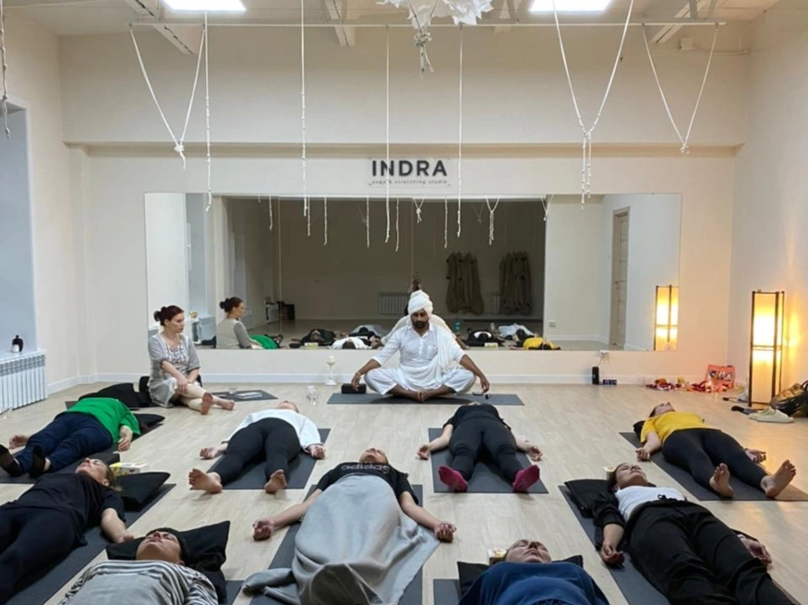 students with yoga teacher