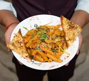 Fresh vegetarian pasta meal served as part of yoga retreat dining