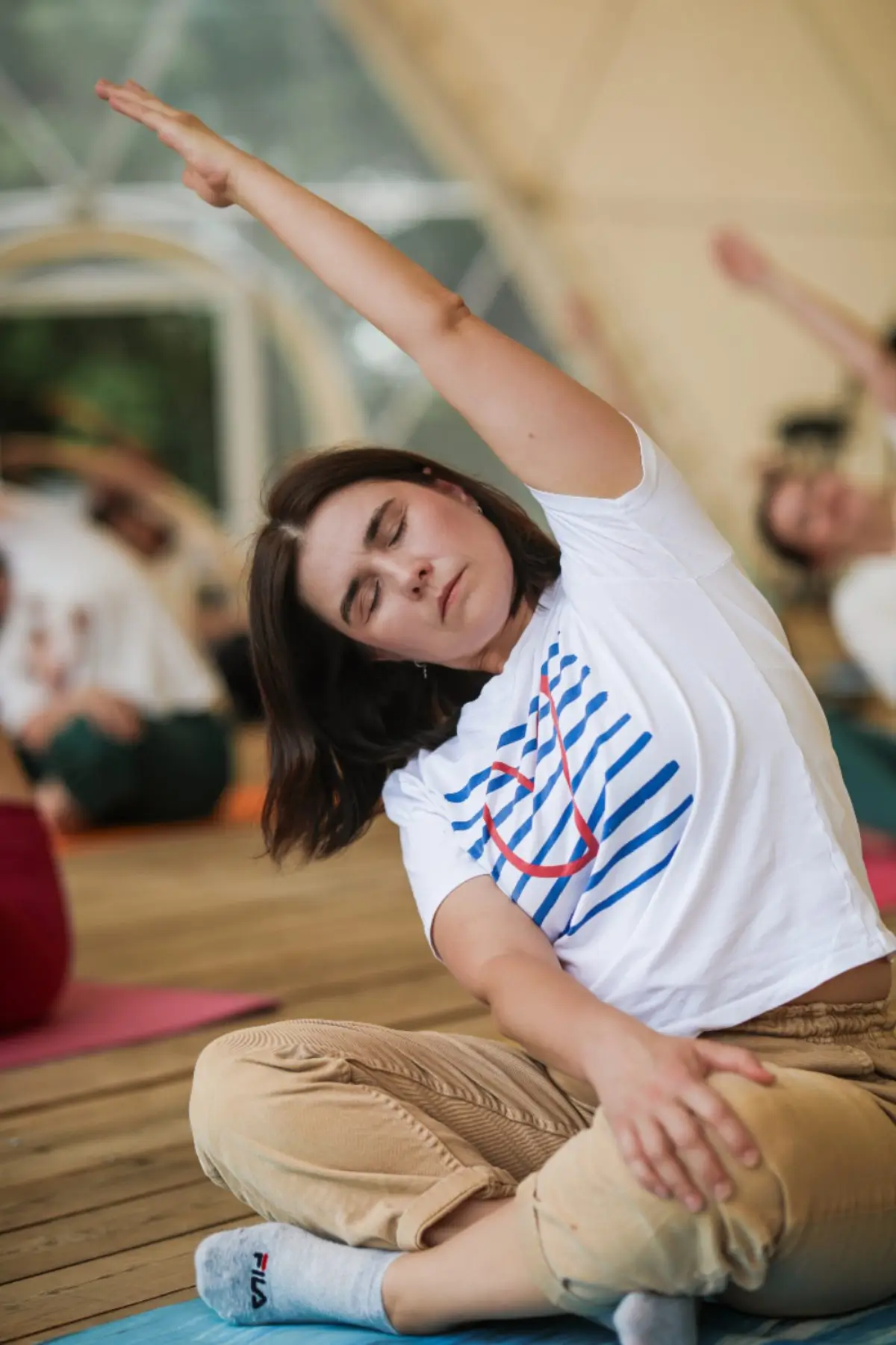student practicing yoga during yoga retreat in rishikesh