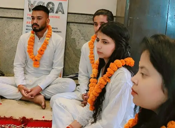 yttc students with yoga teacher at mrityunjay yogpeeth